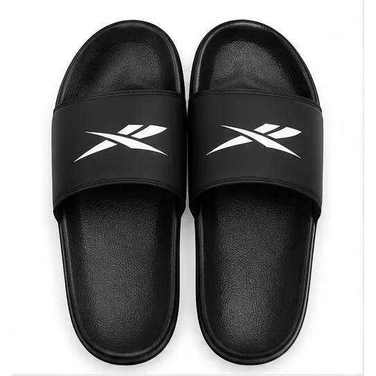 Reebok black slide sandals with white Vector-style logo and open-toe slip-on design